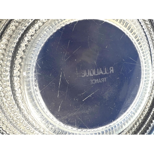 465 - R LALIQUE: a wide rimmed shallow bowl with pearlescent rim, a geometric pattern of 1cm 'rods' with r... 