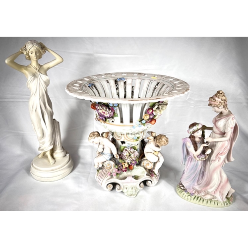 497 - An impressive Continental Messien-style porcelain table centre with three cherubs sitting under bowl... 