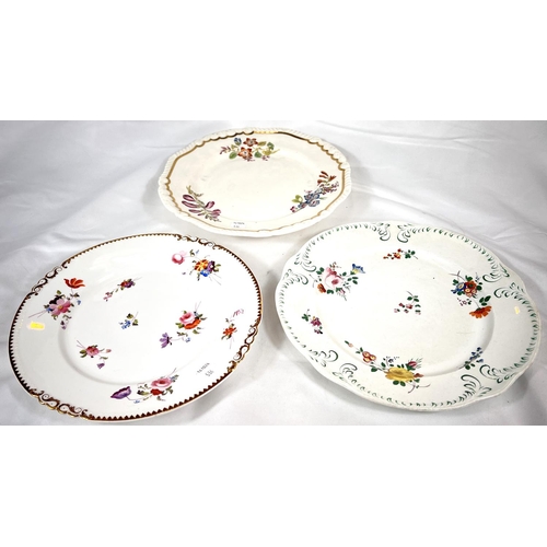 536 - 2 Rockingham plates with polychrome floral decoration, griffin marks in rectangle. Diameter 25cm (on... 