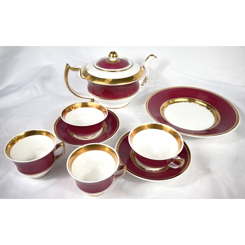 539 - A Rockingham pink and gilt 8 piece part tea set, saucers with griffin mark, comprising of a teapot, ... 