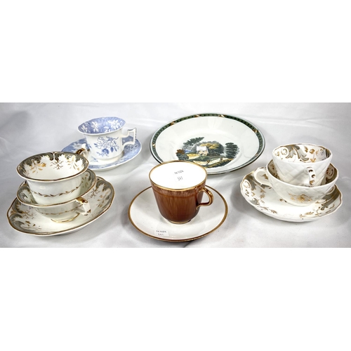 541 - An early Rockingham style trio set in grey and gilt, comprising a tea cup, coffee cup and saucer; a ... 