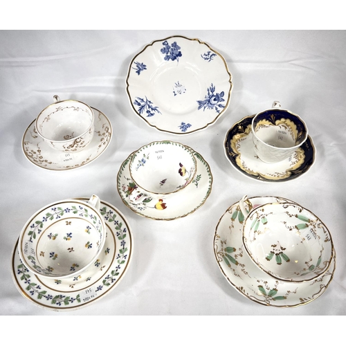 543 - 3 early 19th century Rockingham tea cups & Saucers with griffin marks; 2 unmarked cups and sauce... 