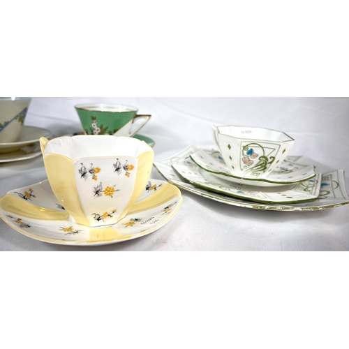 546 - A Wileman Foley Art Nouveau trio set and matching bread and butter plate; a shelley 1930's cup and s... 