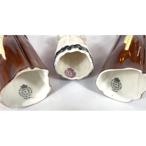 573 - A pair of Royal Worcester monk candlesnuffers and a similar nun