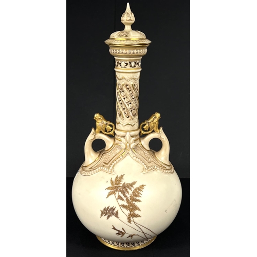 575 - A Worcester porcelain covered vase with tall slender neck decorated in the Aesthetic style with gilt... 