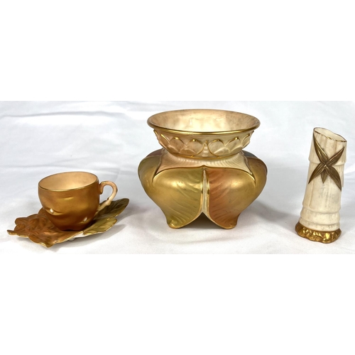 576 - Royal Worcester - a cabinet cup in the form of a gilt potato with leaf saucer; a squat vase in peach... 