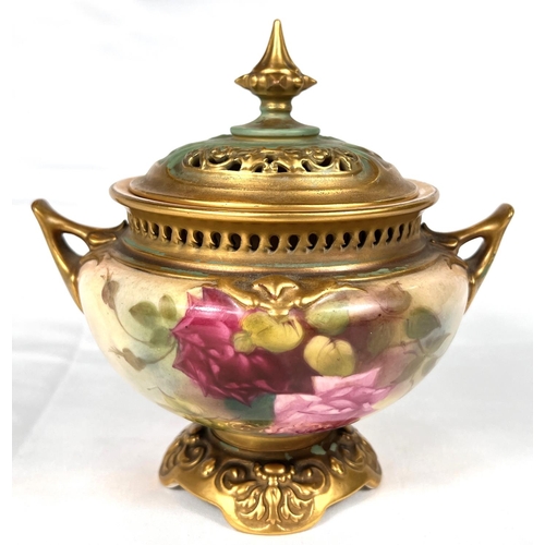 579 - ROYAL WORCESTER: a two handled potpourri decorated in enamels with roses, 15cm