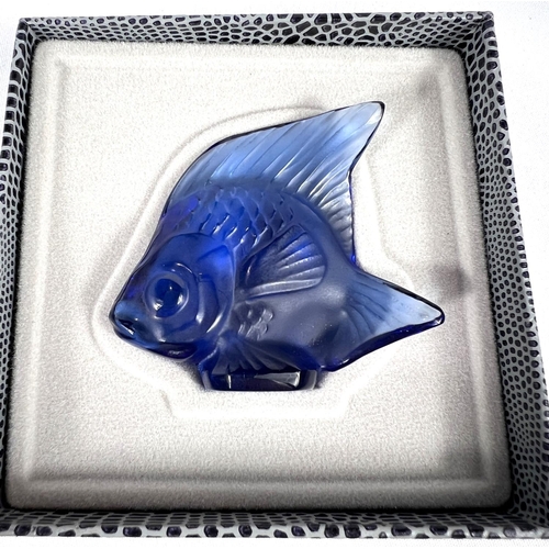 586 - LALIQUE: a sapphire blue glass fish seal, engraved signature, original box