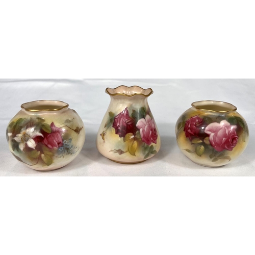 599 - Royal Worcester : a globular posy vase decorated with roses, 7cm; a similar vase and another of coni... 