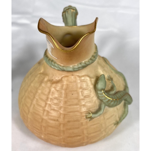 600 - Royal Worcester: a peach ground jug with textured basketry finish and applied lizzard Rd No 226402, ... 