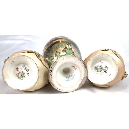 601 - Royal Worcester: a small pair of ovoid peach ground vases enamelled with flower sprays, 11.4cm and a... 