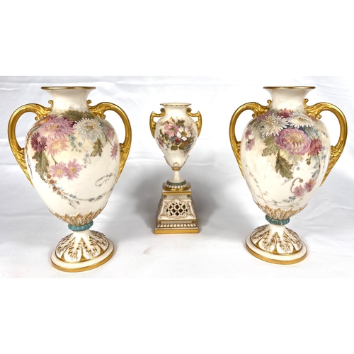 602 - a pair of two handled baluster pedestal vases decorated with enamelled floral sprays, 19cm Rd No 327... 