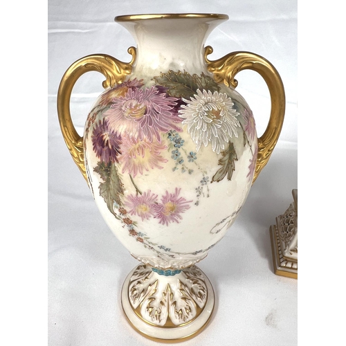 602 - a pair of two handled baluster pedestal vases decorated with enamelled floral sprays, 19cm Rd No 327... 