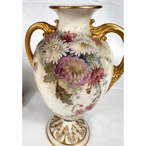 602 - a pair of two handled baluster pedestal vases decorated with enamelled floral sprays, 19cm Rd No 327... 