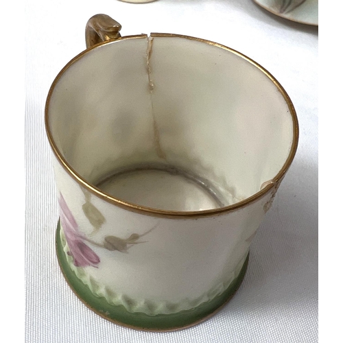 603 - Royal Worcester: A peach ground miniature mug decorated with flowers, 4cm, a similar pair (one a.f.0... 