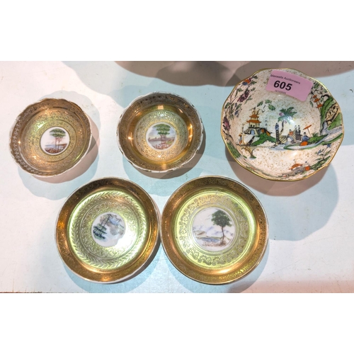 605 - Four continental gilt dishes with central hand painted panel, diameter 9.5cm and a Worcester bowl.