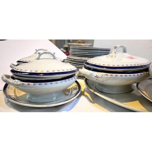 621 - A 19th century ceramic dinner service with tureens, plates etc.