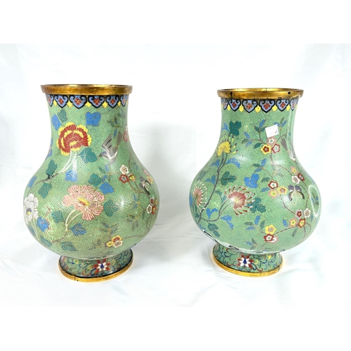 623A - A large mirror pair of 19th century Chinese cloisonne vases with gilt rims and feet, in sage green w... 