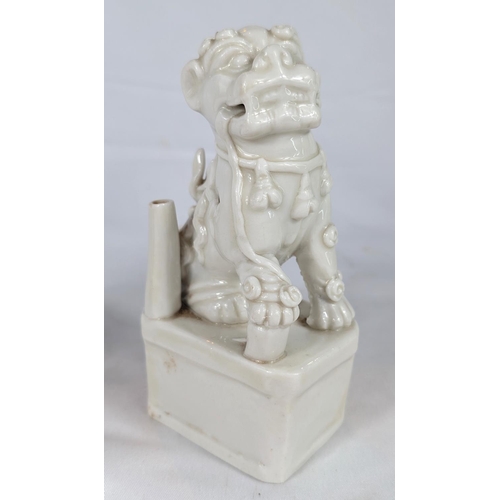 625 - A 17th/18th century Chinese blanc de chine Dehua Buddhistic Lion joss stick holder, ht. 13.5cm