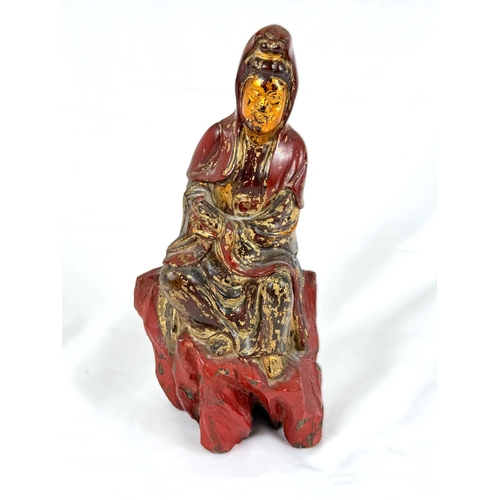 626A - A possibly early  Chinese carved wooden figure of Guanyin, gilt and red lacquer, height 30cm&nb... 