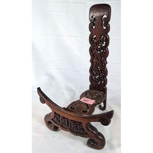 641 - A Chinese carved hardwood dish stand.