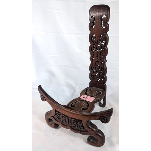 641 - A Chinese carved hardwood dish stand.