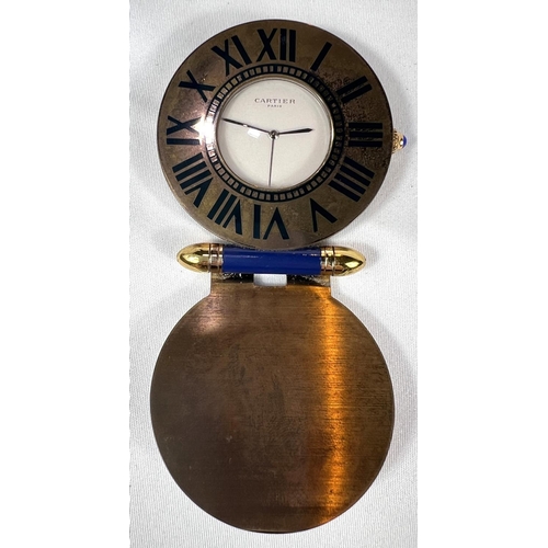 660 - CARTIER, a modern enamelled gilt brass travel clock, 54mm diameter