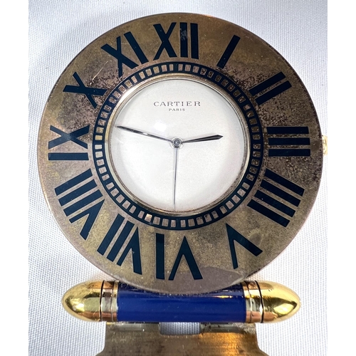 660 - CARTIER, a modern enamelled gilt brass travel clock, 54mm diameter