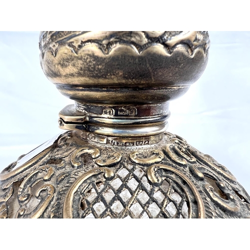 673 - A scent bottle, silver mounted hobnail cut glass, Chester ; a double ended scent bottle and 2 others