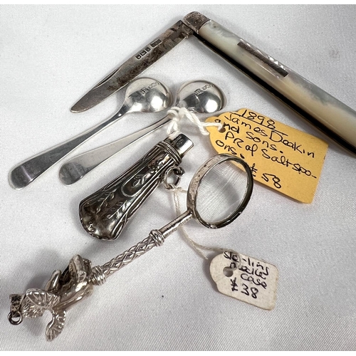 674 - A small magnifying glass with white metal mount; a pair of silver salt spoons an other collectables