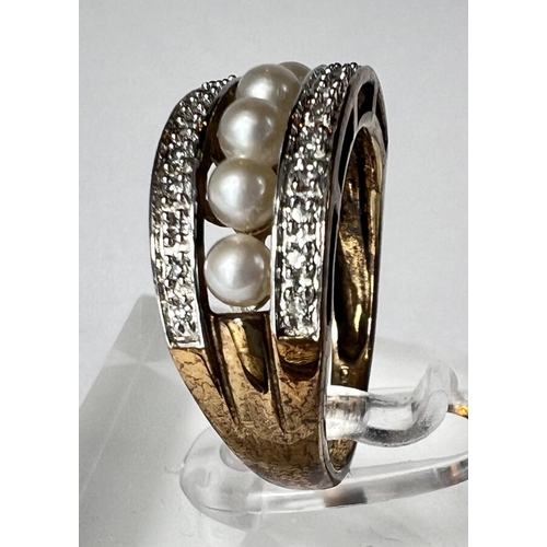 689 - A pearl and diamond ring, 9ct hallmarked yellow gold, central row of 6 pearls with a row of small di... 