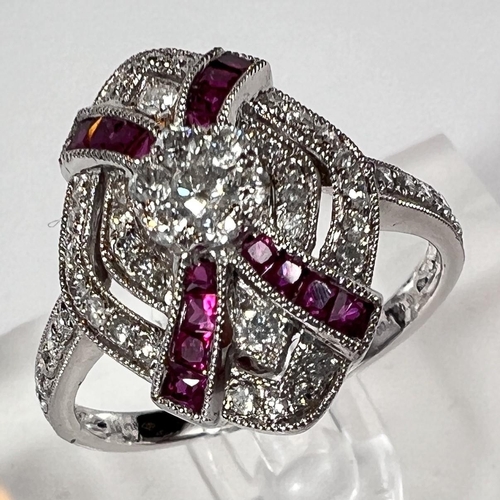 690 - An Art Deco diamond and ruby white gold ring stamped 18ct, diamond content 0.51carat, ruby 0.30 cara... 