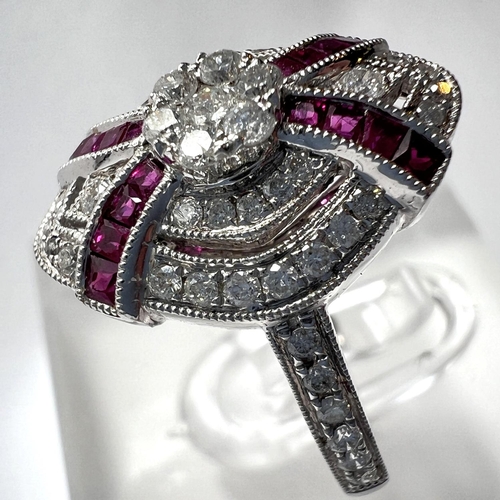 690 - An Art Deco diamond and ruby white gold ring stamped 18ct, diamond content 0.51carat, ruby 0.30 cara... 