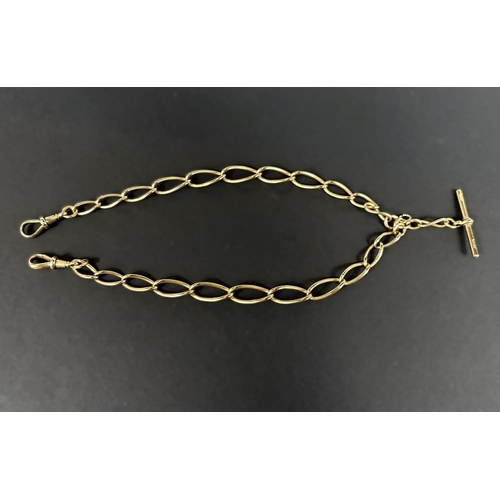 699 - A 9ct hallmarked gold watch chain formed from large oval links with central bar and 2 end clips, 35g... 