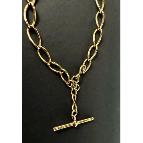 699 - A 9ct hallmarked gold watch chain formed from large oval links with central bar and 2 end clips, 35g... 