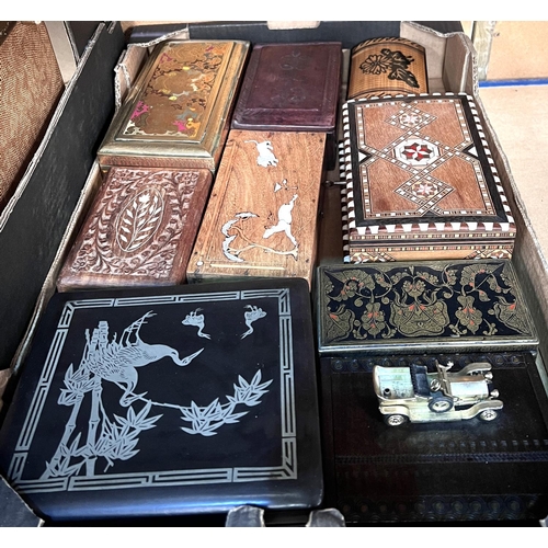 73 - A selection of inlaid and other boxes.