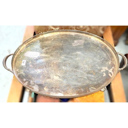 736 - A large oval silver on copper gallery tray with chased decoration, length 74cm.