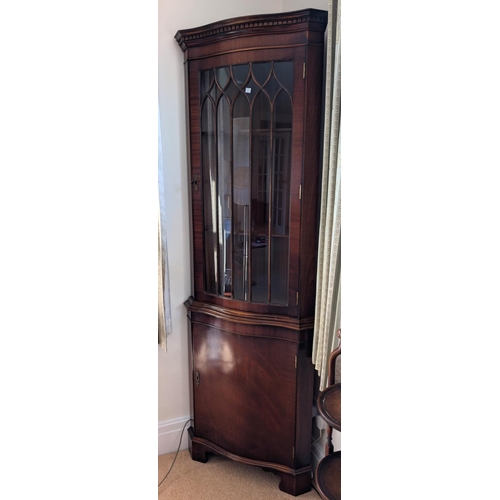 856 - A reproduction mahogany two height bookcase with two drawers above; a good quality full height glaze... 