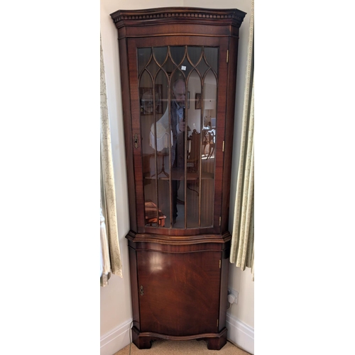 856 - A reproduction mahogany two height bookcase with two drawers above; a good quality full height glaze... 