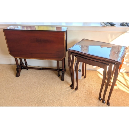 857 - A reproduction mahogany drop leaf Pembroke table, canted edges; a nest of three mahogany tables.