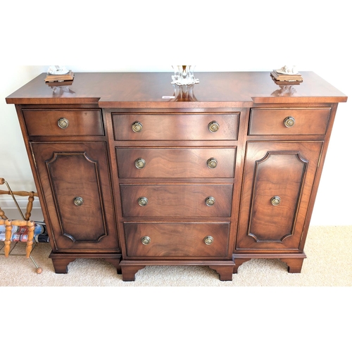 859 - A mahogany Bevan Funnell Reprodux break front sideboard, 6 drawers, 2 cupboards, length 106cm.