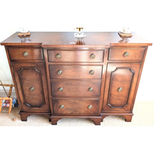 859 - A mahogany Bevan Funnell Reprodux break front sideboard, 6 drawers, 2 cupboards, length 106cm.