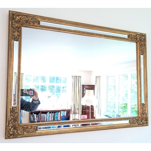 866 - A gilt framed overmantle mirror, rectangular form, 69 x 95cm.