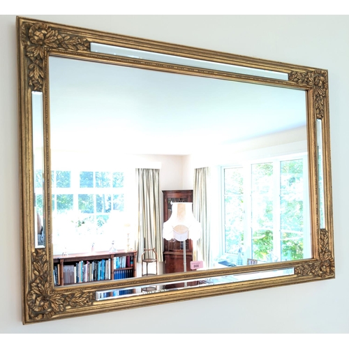 866 - A gilt framed overmantle mirror, rectangular form, 69 x 95cm.