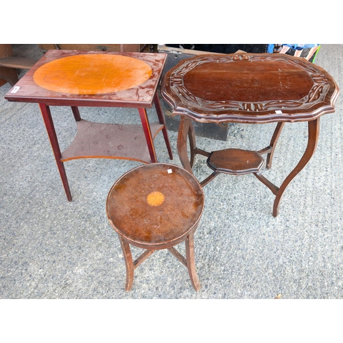 873 - An inlaid mahogany fold over table, a circular inlaid occasional table and another, and wine table