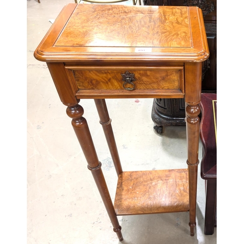 891 - A reproduction two tier plant stand with single drawer above