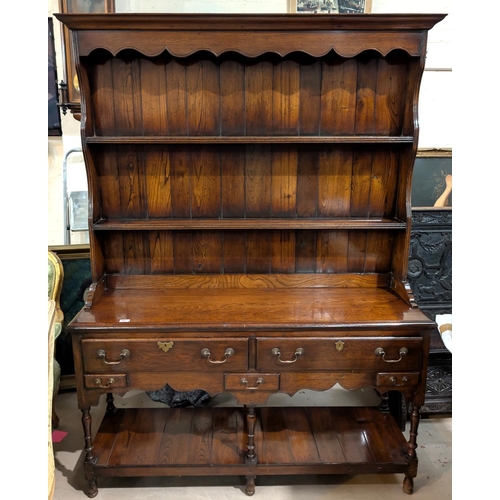 906 - A reproduction oak Titmarch and Goodwin style traditional Welsh Dresser with two long and two short ... 