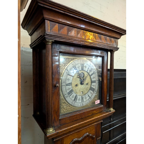 907 - A V. Wilson Kendal, oak cased grandfather clock with brass dial with moon phase, signed with inlaid ... 