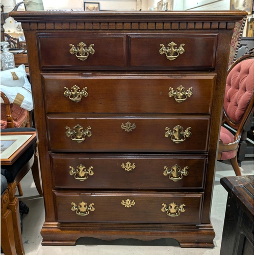 915 - A mahogany reproduction chest of four long and two short drawers. 108 x 87 cm.