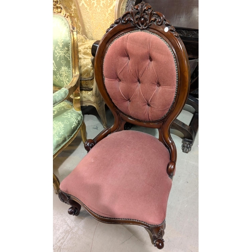 916 - A high back tapestry chair with barley twist legs and a spoon button back chair and an oak table.